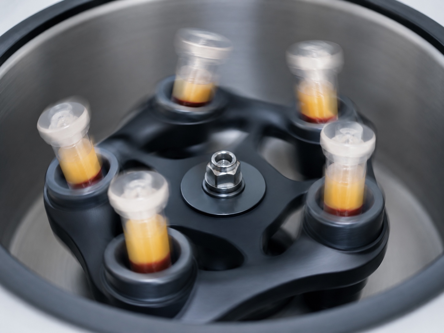Centrifuge in motion with blood samples