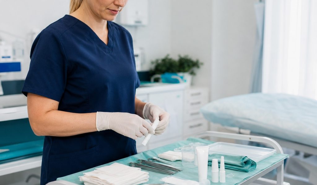 Healthcare professional preparing medical supplies